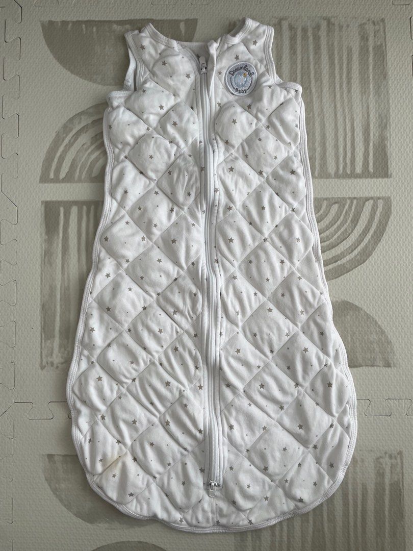 Dreamland Weighted Sleep Sack (Category: Babies & Kids Fashion) located in Cavite. Submitted by nering (Listing ID 1341785166, Image 2). Description: Dreamland Weighted Sleep Sack • Size: Medium 6-12 M | 15-24 lbs | 7-12 kgs • Has a minimal yellow stain at the bottom part (see the picture) • Got this for P3,600 • FREE Halo Sleep Sack Multi-way Swaddle (see the last photo).