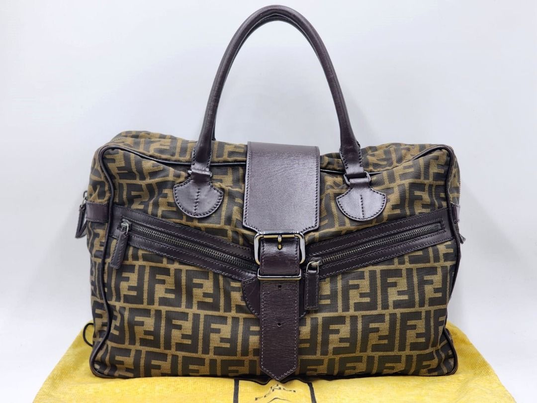 Fendi Zucca Zucchino Duffel Boston Travel Bag (Category: Bags & Wallets) located in Melbourne. Submitted by designercollectibles.com.au (Listing ID 1341836794, Image 1). Description: Condition: Good, As this is a pre-loved item, there are scratches and tarnish on the hardware and general signs of wear. Please check the condition carefully from these pictures. Since this is a preloved item, there is a possibility that it has undergone care and mai