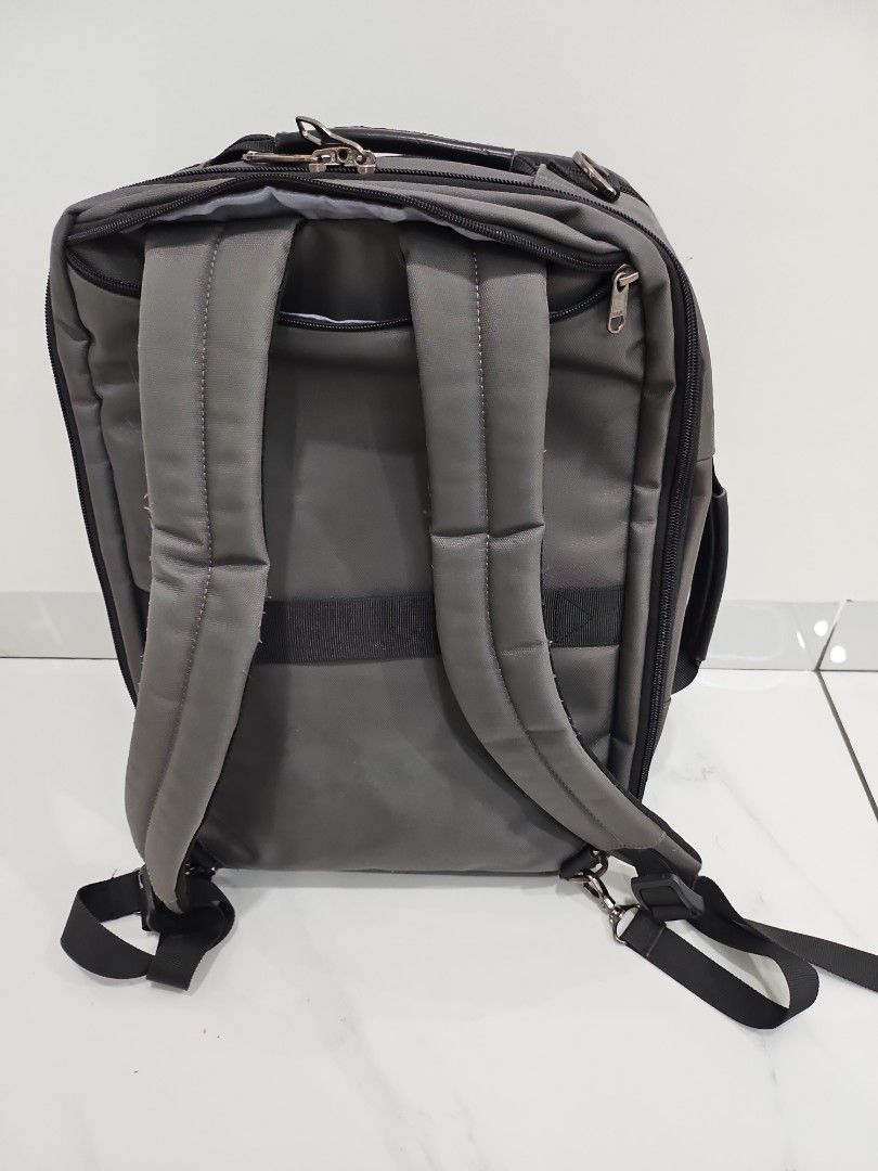 Grey backpack (Category: Backpacks) located in Kuala Lumpur. Submitted by yan9188 (Listing ID 1341844721, Image 3). Description: Many compartments.
