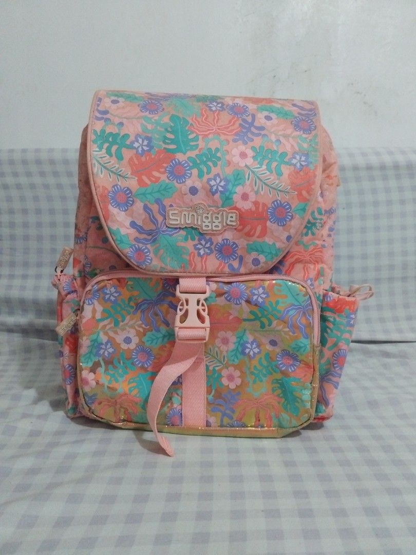 SMIGGLES PASTEL COLORFUL BACKPACK ORIGINAL (Category: Babies & Kids Fashion) located in Las Pinas. Submitted by goldinbox (Listing ID 1341932332, Image 1). Description: USED AND WASHED ALREADY THEN STORED WITH SIGN OF USAGE BUT WELL USED ITEM BOUGHT FROM LONDON UNIQUE DESIGN FULLY PADDED SHOULDER STRAP FOR BACK COMFORT SPACIOUS WITH INTERNAL COMPARTMENT ELEGANT STYLE AND ATTRACTIVE HEIGHT:14 IN WIDTH 12 IN SPACIOUS.
