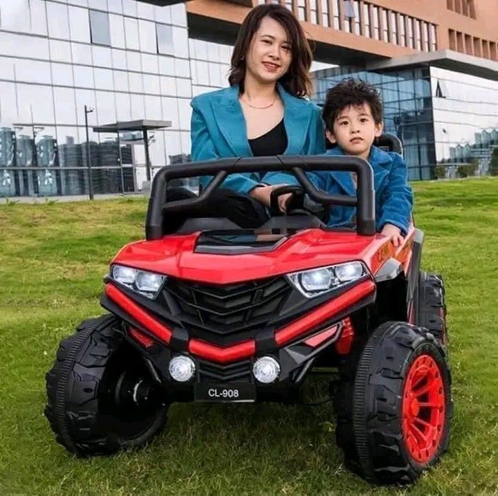 #908 Atv big 4x4 (Category: Remote Control Toys) located in Manila. Submitted by minidivisoria (Listing ID 1342118786, Image 1). Description: #908 Atv Big 4x4 /2 seater/4 Gears/Big Rubber tires Leather seats/Usb / MP3/ Lights w/ switch Remote n manual drive/ Left handed steering Shocks / Swing function Up to 1-15 year old red blue white Orenge color.