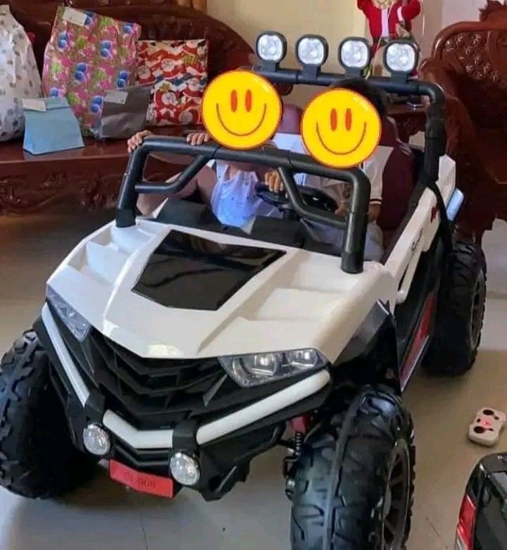 #908 Atv big 4x4 (Category: Remote Control Toys) located in Manila. Submitted by minidivisoria (Listing ID 1342118786, Image 3). Description: #908 Atv Big 4x4 /2 seater/4 Gears/Big Rubber tires Leather seats/Usb / MP3/ Lights w/ switch Remote n manual drive/ Left handed steering Shocks / Swing function Up to 1-15 year old red blue white Orenge color.