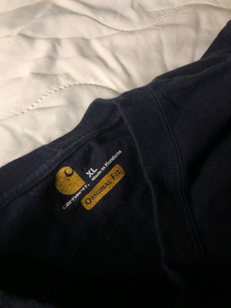 CARHARTT Original Fit w/ pocket (Category: Tshirts & Polo Shirts ) located in Las Pinas. Submitted by junkdrawers (Listing ID 1342038006, Image 2). Description: - 2 of the exact same carhartt shirts on hand - decent quality but w/ slight print fades due to use - shirt is a very dark blue for any inquiries or concerns, kindly contact the seller 🩷 ….thank you📮💌 !…...