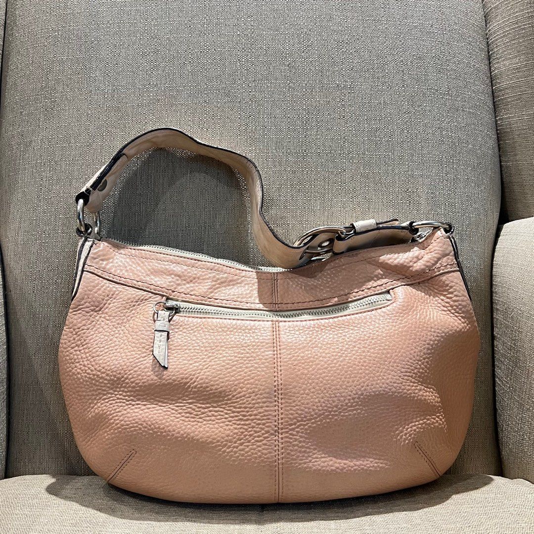 Coach Hobo bag medium (Category: Luxury Bags & Wallets) located in Paranaque City. Submitted by missb1001 (Listing ID 1342068198, Image 3). Description: Coach hobo F13730 Medium size Issues: The strap was recolored, and there are some cracks on the handle. I purchased it here on Carousell and didn’t notice the strap was recolored until I saw it in person. 🙈 However, the body is clean with no leather rubs or cracks, making it still a pleasant bag