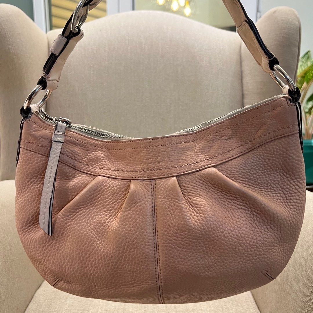 Coach Hobo bag medium (Category: Luxury Bags & Wallets) located in Paranaque City. Submitted by missb1001 (Listing ID 1342068198, Image 1). Description: Coach hobo F13730 Medium size Issues: The strap was recolored, and there are some cracks on the handle. I purchased it here on Carousell and didn’t notice the strap was recolored until I saw it in person. 🙈 However, the body is clean with no leather rubs or cracks, making it still a pleasant bag