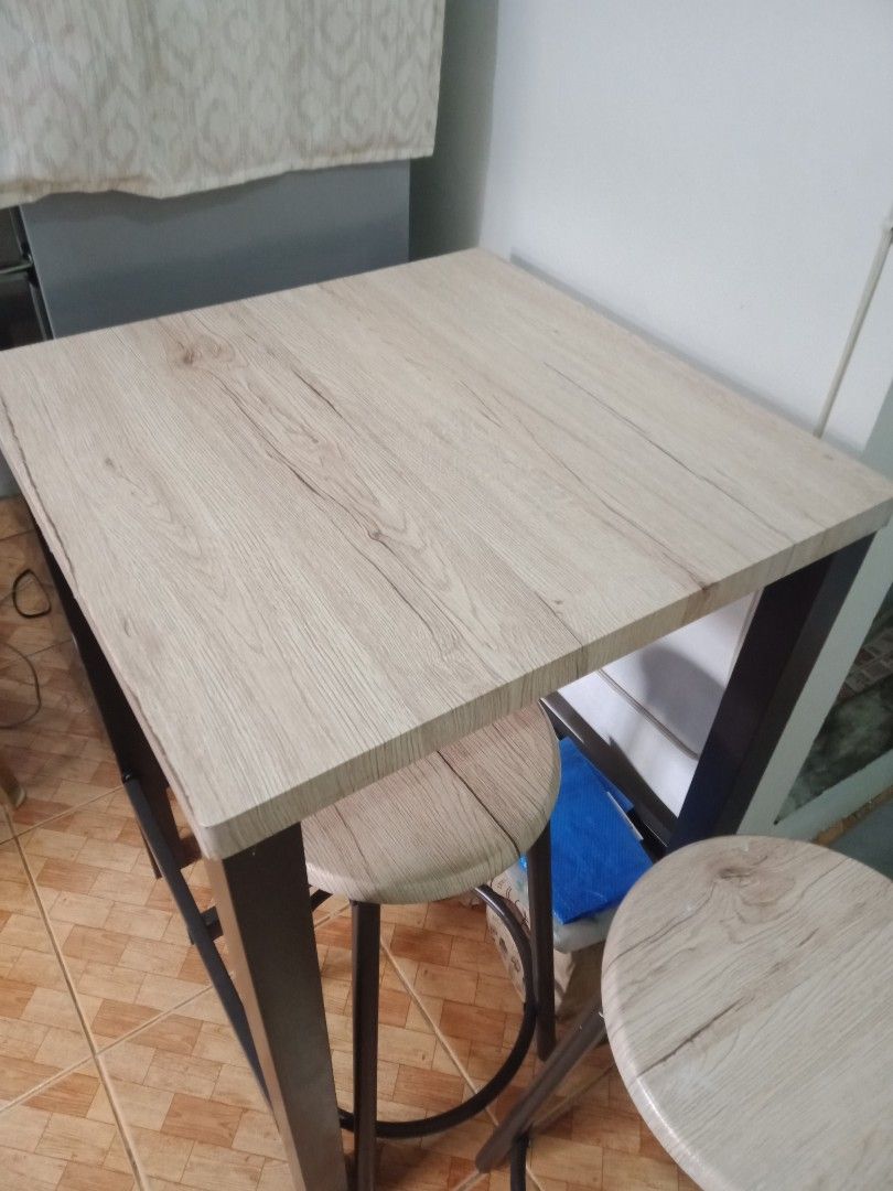 Dining set table/chairs for 2 (Category: Other Home Furniture) located in Makati City. Submitted by clutterms (Listing ID 1341970055, Image 2). Description: dining set for 2 persons 1 table and 2 stools/chairs measurement: table length/width: 24 inches table height: 34 inches rfs: change of furniture. decluttering. pick up location: pembo, taguig shipping schedule: tuesday only sf shouldered by buyer.