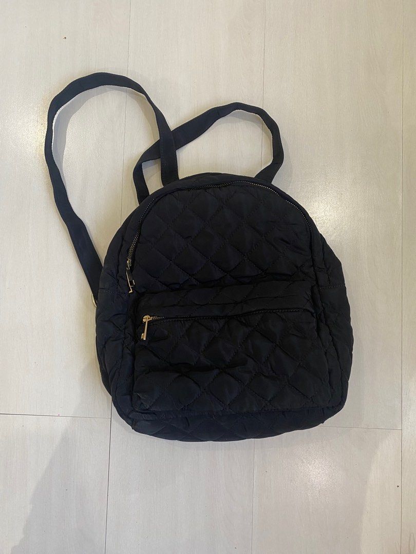 FOREVER 21 Women Black Quilted Backpack (Category: Backpacks) located in Manila. Submitted by mxthrs (Listing ID 1342004778, Image 1). Description: Product Details Black backpack Non-Padded haul loop 1 main compartment with zip closure Non-Padded back 1 external zip pocket Non-Padded shoulder strap Volume: up to 23 litres Model Size & Fit Height: 21 cm Width: 16 cm Depth: 10 cm Material & Care Synthetic Wipe with a clean, dry cloth to remove dust