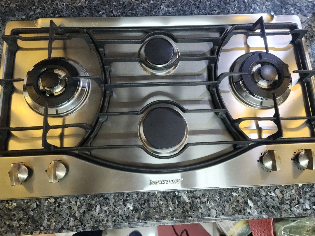 La germania stove (Category: Cookware & Accessories) located in Manila. Submitted by bestbuys.bestbuys (Listing ID 1342053320, Image 2). Description: never used naka display lang sa condo as in never nalutuan or nasalpakan ng gas or saksak ng kuryente display lang sa condo.