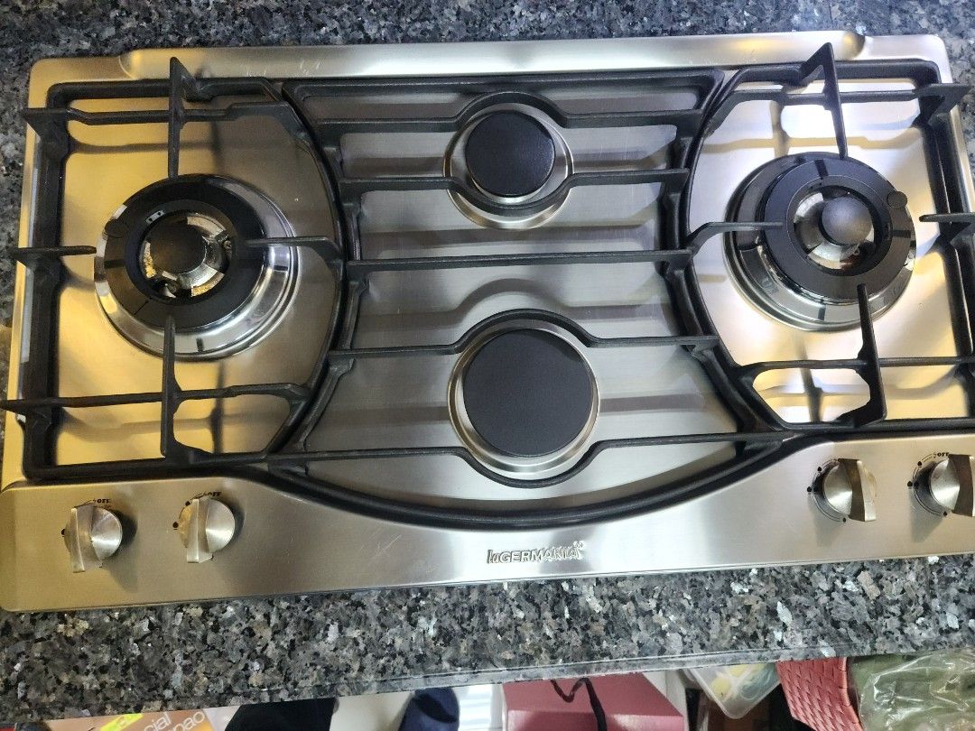 La germania stove (Category: Cookware & Accessories) located in Manila. Submitted by bestbuys.bestbuys (Listing ID 1342053320, Image 1). Description: never used naka display lang sa condo as in never nalutuan or nasalpakan ng gas or saksak ng kuryente display lang sa condo.