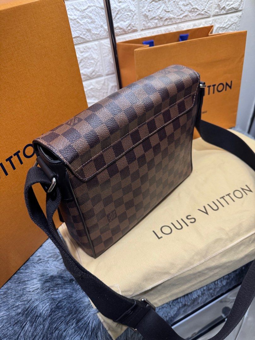 LV Damier District Messenger Bag (Category: Luxury Bags & Wallets) located in Quezon City. Submitted by christineboller (Listing ID 1342125352, Image 3). Description: Louis Vuitton District Damier messenger bag. In 9.5/10 condition, serial no. CA0197 (Year 2017) comes with dustbag, box and paper for only Php52k .