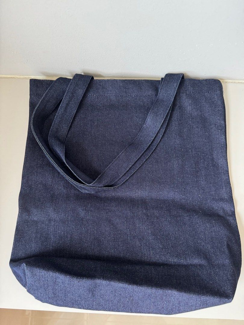 Marithe Tote Bag (Category: Tote Bags) located in Singapore. Submitted by xyz900 (Listing ID 1341998534, Image 2). Description: 100% Authentic tote bag from Marithe. Brand new unused. Measurement: 36cm (H) by 35cm (L) Color: Denim Dark Wash Blue Material: Denim/Canvas.