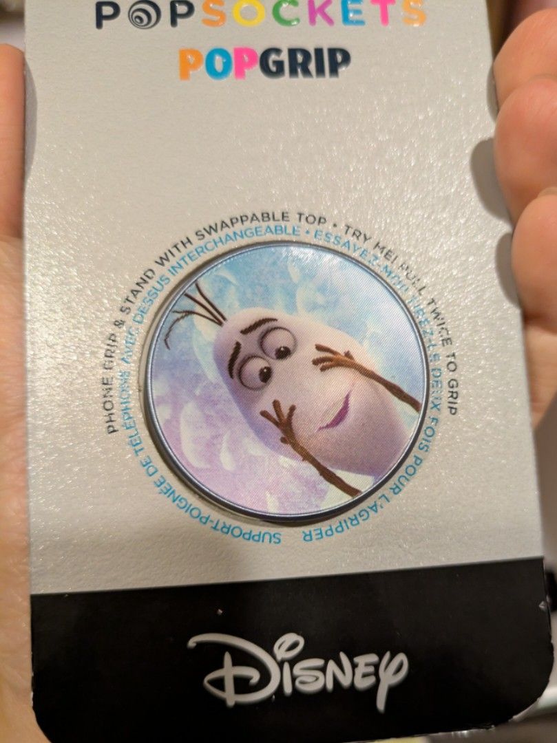 Popsockets (Category: Everything Else) located in Singapore. Submitted by missmanja (Listing ID 1341973182, Image 3). Description: Went overboard and bought too many. Brand new. The Olaf piece has a holographic quality to it. Zootopia SGD25 Tiana SGD18 Olaf SGD22.
