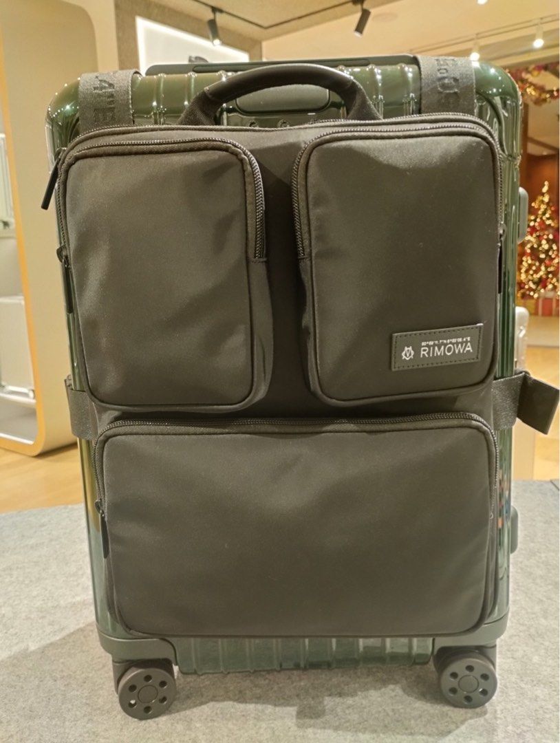 Rimowa Cabin Harness (Category: Luggage) located in Makati City. Submitted by orenjiroku (Listing ID 1342132563, Image 1). Description: Pictures are for sample purposes. Luggage not included. Brandnew condition Crafted from high-quality nylon, the RIMOWA Cabin Luggage Harness in Black streamlines the experience of travelling with hand luggage. Conveniently secured to your RIMOWA Cabin suitcase using adjustable straps, it boasts a clever formation