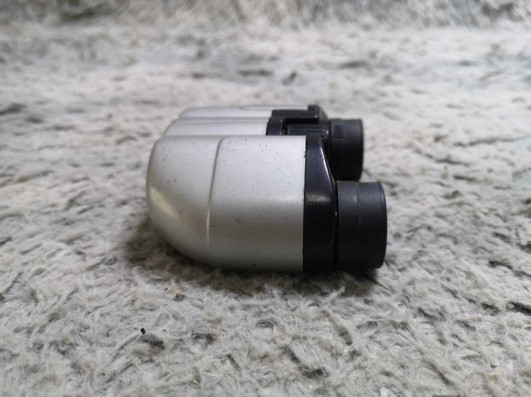 Silver Compact Binocular (Category: Lens & Kits) located in Santa Cruz. Submitted by jmy_surplus.2 (Listing ID 1341987760, Image 3). Description: Size ; L - 11cm W - 9cm Color ; Silver Type ; Binocular Brand ; No brand Material ; Plastic Style ; Silver Compact Binocular LG 96 JMY 4.