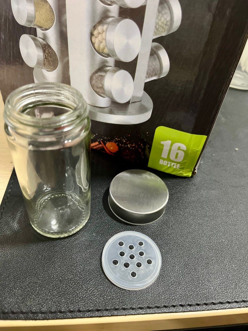 Spice Carousel (Category: Spice & Seasoning) located in Makati City. Submitted by eazsyone (Listing ID 1342142478, Image 2). Description: 16 Jars 7 Jars unused 11 Jars used 360 degrees rotating carousel Buyer to pay shipping fee.