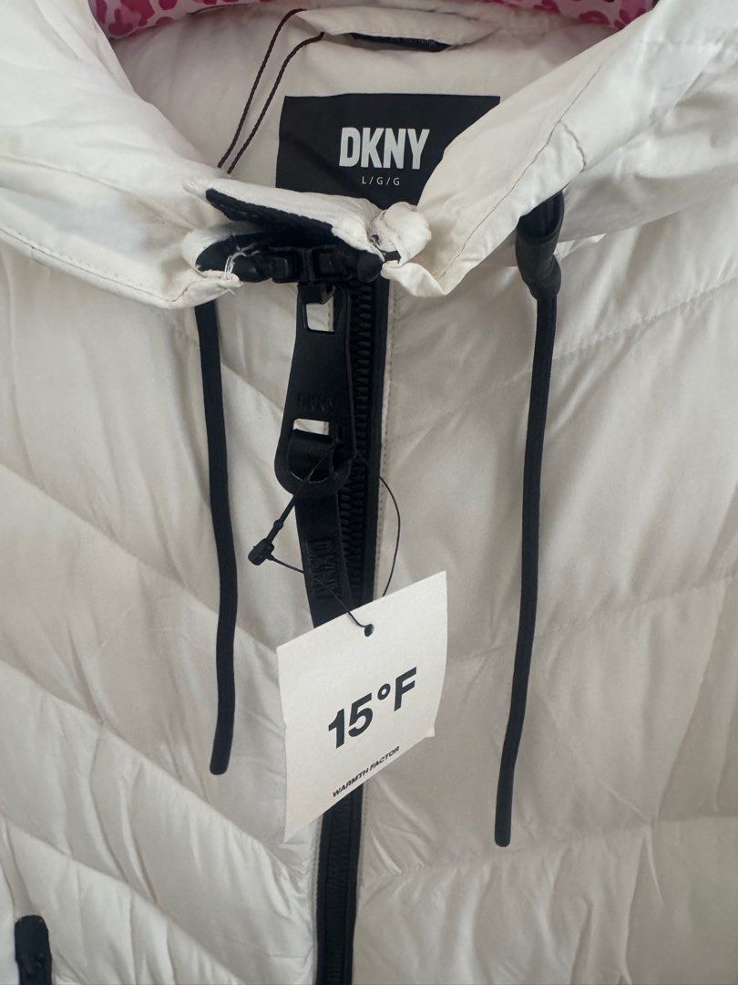 Winter Jacket (Category: Coats, Jackets and Outerwear) located in Singapore. Submitted by minmint (Listing ID 1342009266, Image 2). Description: 🗽 Brand new with tag 🗽 100% Authentic DKNY 🗽 For up to 15F 🗽Comes with 2 pockets 🗽 Light weight .