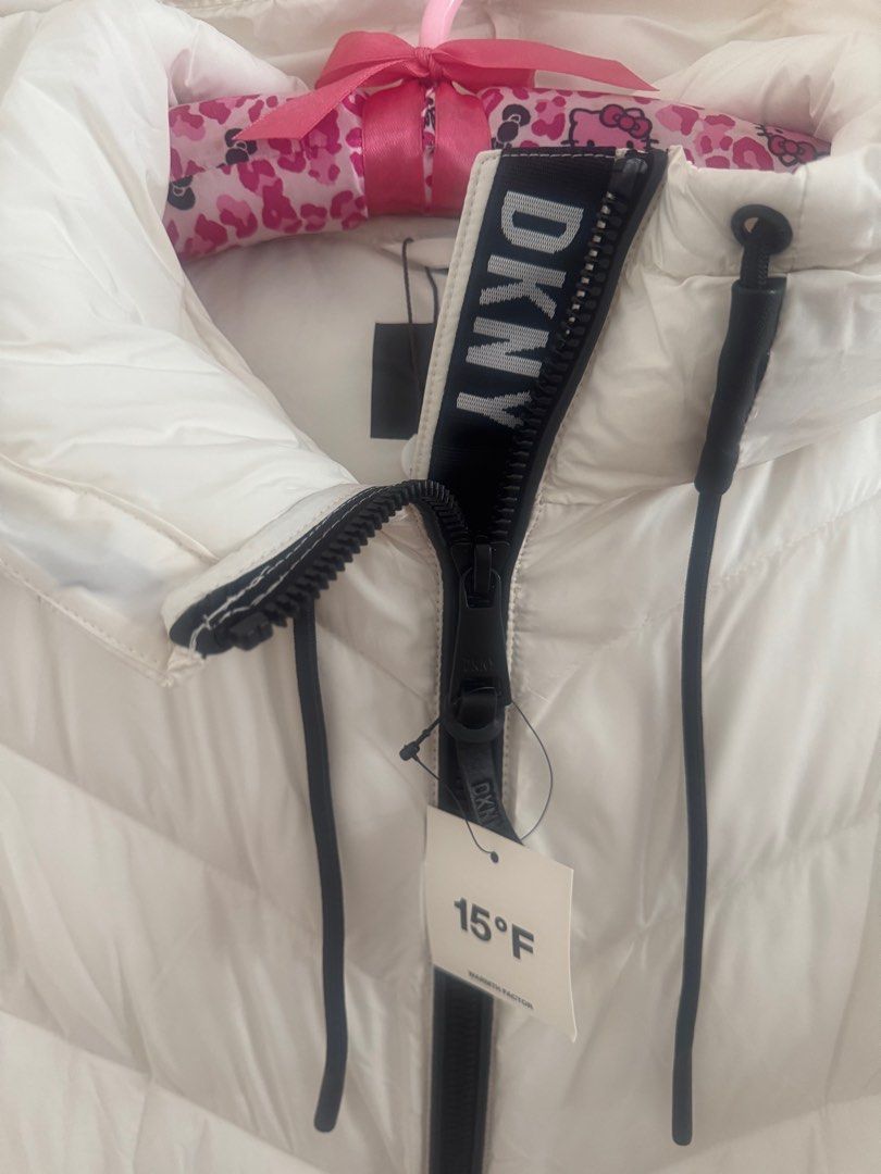 Winter Jacket (Category: Coats, Jackets and Outerwear) located in Singapore. Submitted by minmint (Listing ID 1342009266, Image 3). Description: 🗽 Brand new with tag 🗽 100% Authentic DKNY 🗽 For up to 15F 🗽Comes with 2 pockets 🗽 Light weight .
