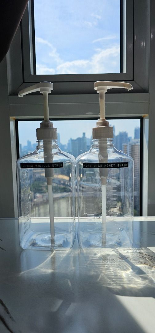 2pcs 1600ml Hand Pressed Sugar Bottle Liquid Dispenser (Category: Everything Else Others) located in Mandaluyong City. Submitted by coffeebara (Listing ID 1342278943, Image 1). Description: RFS: Too big for my use case - With Scale Coffee Syrup Bottle - With Pump Nozzle Head Jar Container - Used only several times.