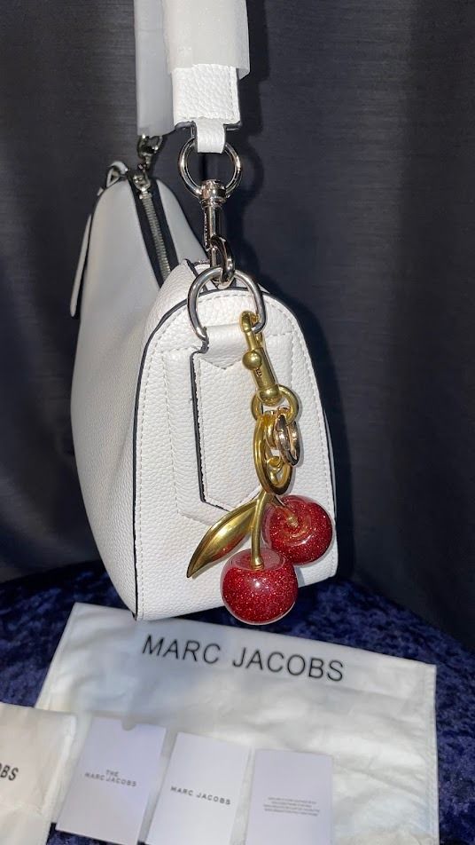 Authentic Marc Jacobs Drifter Hobo Bag (Category: Luxury Bags & Wallets) located in Cavite. Submitted by sheebagsetc (Listing ID 1342311607, Image 3). Description: 💙Complete inclusions (dust bag, care cards & instructions, with 2 straps, w/ care dust bag) In excellent condition Light weight Can fit long wallet Clean inside and outside No flaws Color may vary due to lighting. Always zoom photos. 💙Cherry accessories is not included..