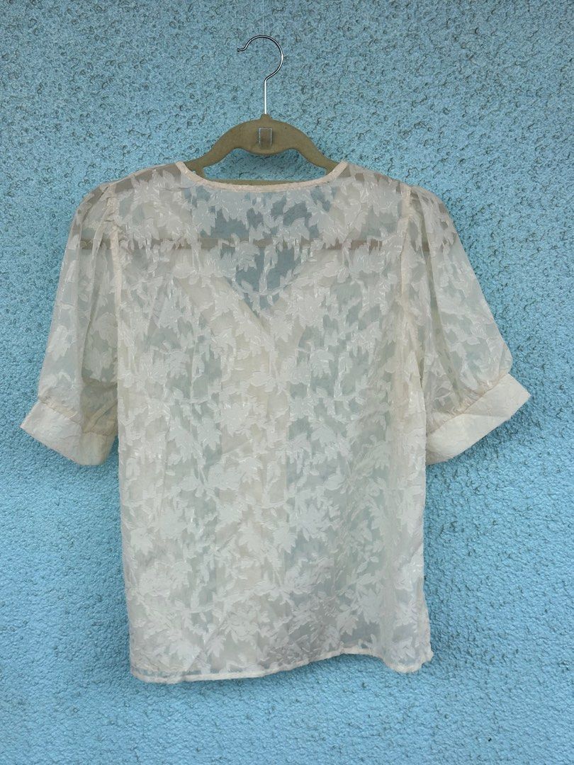 Cream Textured See Through Button Down Blouse (Category: Blouses) located in Las Pinas. Submitted by prelovedbyaix (Listing ID 1342222914, Image 2). Description: chest: 40 in length: 23 in armhole: 12.5 in sleeve length: 11.5 in Pearl buttons.