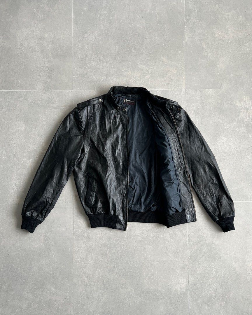 Members Only Racer Leather Jacket (Category: Coats, Jackets and Outerwear) located in Manila. Submitted by morf_sply (Listing ID 1342206034, Image 2). Description: Original classic racer jacket featuring a double snap iconic throat latch, signature shoulder epaulettes and front pocket. With inside pocket, zip closure and two waist pockets. Ribbed cuffs and hems. Fits to Large. Shoulder Width 20.5 in Pit to Pit 25.5 in Length 27.5 in Sleeves 28 in