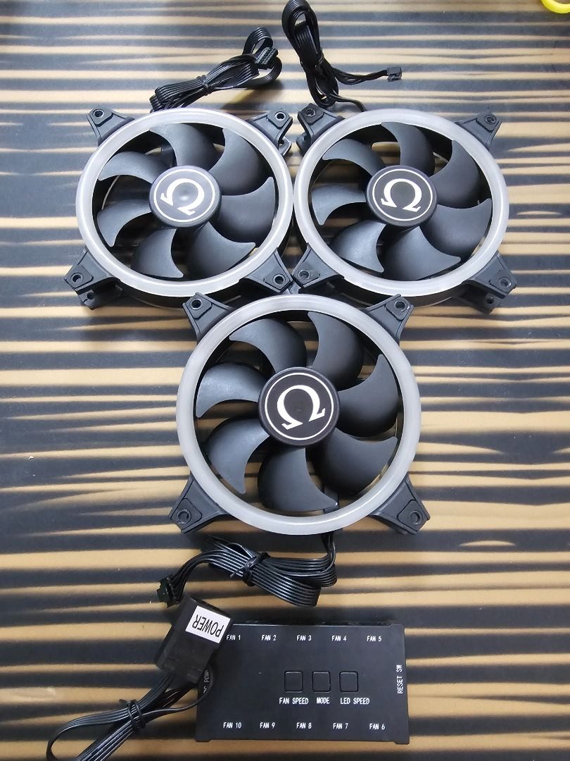 Omega Nova 2 120mm 3in1 Chassis Fan (Category: Other Accessories) located in Mandaluyong City. Submitted by coffeebara (Listing ID 1342272856, Image 1). Description: RFS: Upgraded case fans - Used as exhaust fans - With RGB control hub - No box or receipt included.