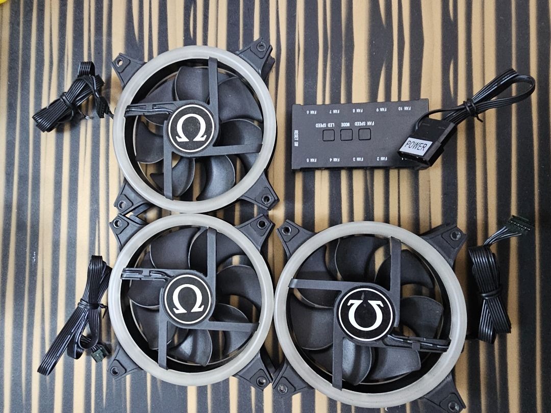 Omega Nova 2 120mm 3in1 Chassis Fan (Category: Other Accessories) located in Mandaluyong City. Submitted by coffeebara (Listing ID 1342272856, Image 3). Description: RFS: Upgraded case fans - Used as exhaust fans - With RGB control hub - No box or receipt included.