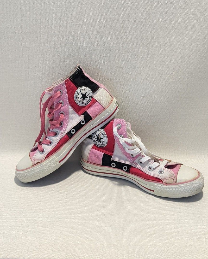 Pink Chuck Taylors High Tops (Category: Sneakers) located in Mandaluyong City. Submitted by clf97 (Listing ID 1342171687, Image 1). Description: Patchwork pink and white chucks, practically no wear on sole. Converse decal starting to peel off from storage. US women size 6. Rubber and fabric still good. Some yellowing with age..