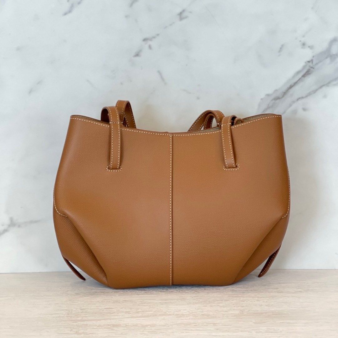 Polène Cyme Mini in Camel (Category: Luxury Bags & Wallets) located in Bacolod City. Submitted by usedbyc (Listing ID 1342255926, Image 2). Description: FOR SALE!!! Polène Cyme Mini in Camel Recently bought (can show proof) Used 2x only but metal cover still intact (will pass as brand new) Php 30k.