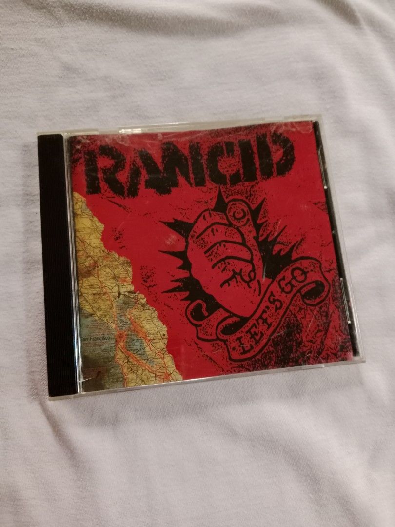 Rancid - Let's Go Punk Rock CD 1994 (Category: CDs & DVDs) located in Rizal. Submitted by wsted_rcords2025 (Listing ID 1342168699, Image 1). Description: Let's Go is the second studio album by the American punk rock band Rancid. It was released on June 21, 1994, through Epitaph Records and was the band's first album to feature Lars Frederiksen on guitar and vocals. The album initially achieved little mainstream success, though it appealed to the 