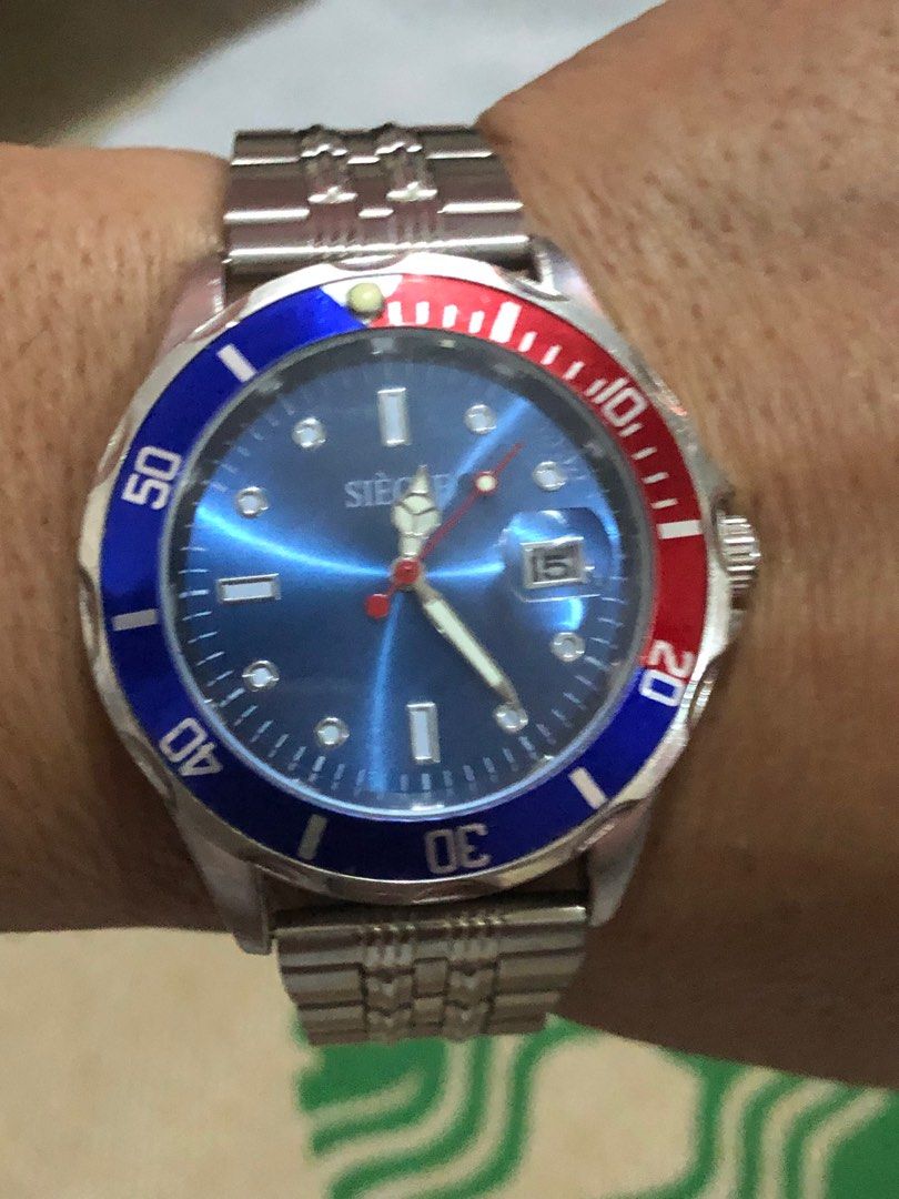 SIECLE WATCH PEPSI (Category: Luxury Watches) located in Makati City. Submitted by tito.luther (Listing ID 1342206286, Image 2). Description: SIECLE Quartz Pepsi P1800 only •Pre-loved Watch •Stainless Steel •Mens Watch Large pick up Makati or Via lalamove Gcash.