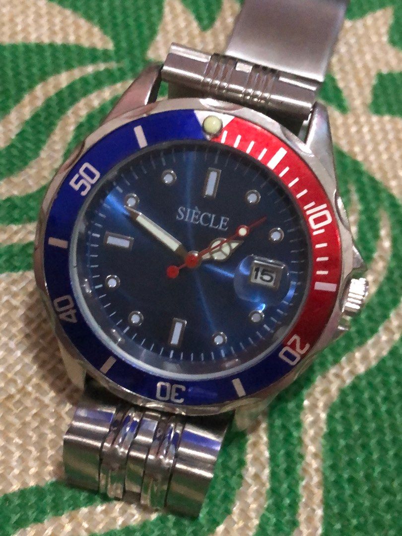 SIECLE WATCH PEPSI (Category: Luxury Watches) located in Makati City. Submitted by tito.luther (Listing ID 1342206286, Image 1). Description: SIECLE Quartz Pepsi P1800 only •Pre-loved Watch •Stainless Steel •Mens Watch Large pick up Makati or Via lalamove Gcash.