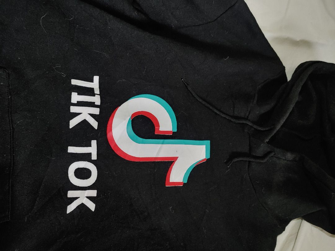 TikTok Black Hoodie (Category: Coats, Jackets and Outerwear) located in Quezon City. Submitted by ppaya (Listing ID 1342171278, Image 2). Description: Last Price. See Measurement. GCash Only. Pickup Only (Diliman Q.C).