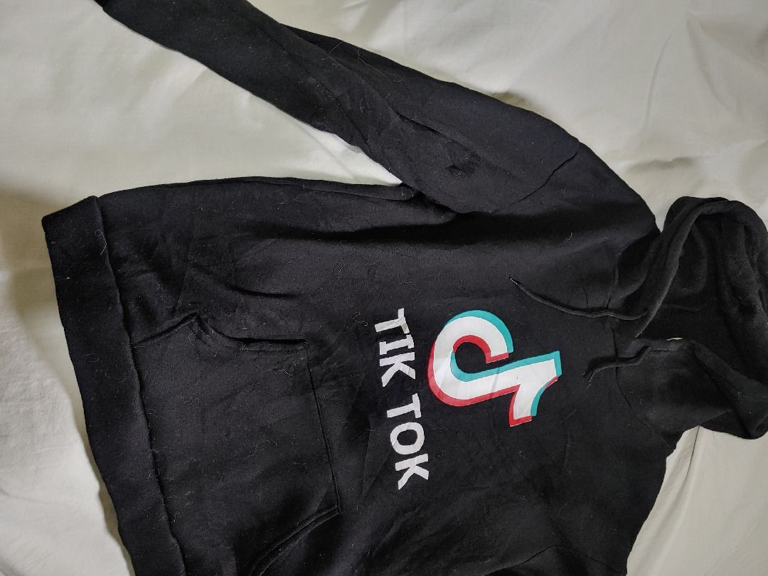 TikTok Black Hoodie (Category: Coats, Jackets and Outerwear) located in Quezon City. Submitted by ppaya (Listing ID 1342171278, Image 3). Description: Last Price. See Measurement. GCash Only. Pickup Only (Diliman Q.C).