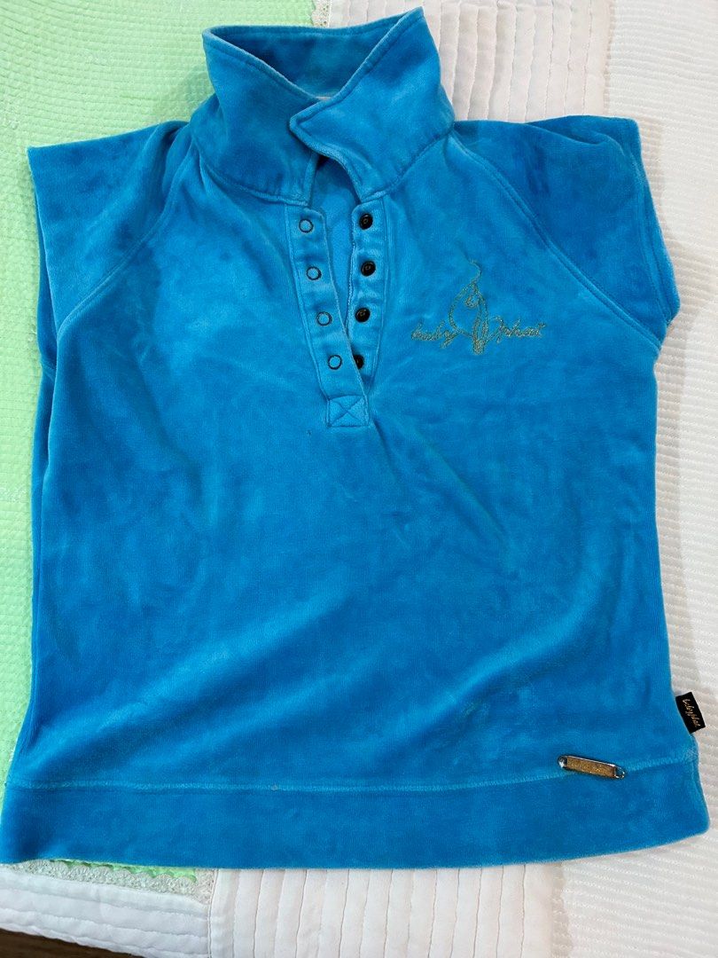 Baby Phat y2k shirt blue (Category: Shirts) located in Quezon City. Submitted by retro_chic25 (Listing ID 1342471949, Image 1). Description: Just has a minor hole :>> price is negotiable ❤️.