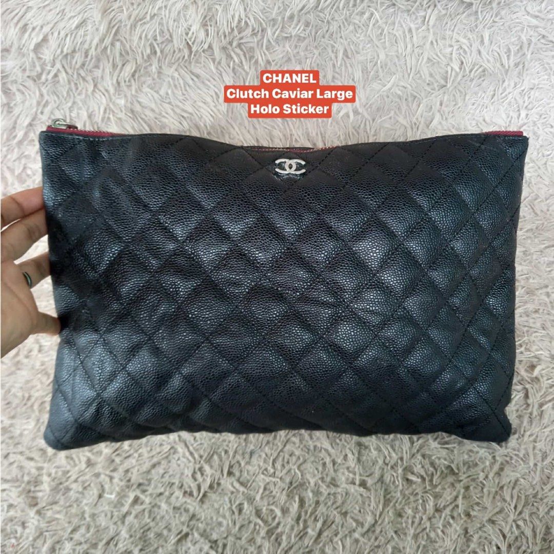 Chanel Clutch Caviar (Category: Luxury Bags & Wallets) located in Pagadian. Submitted by lightbagelyas (Listing ID 1342330721, Image 1). Description: CC Clutch Caviar Large Holo Sticker Made in France Silver Hardware Quilted Caviar Handware Burgundy Lining No issue.