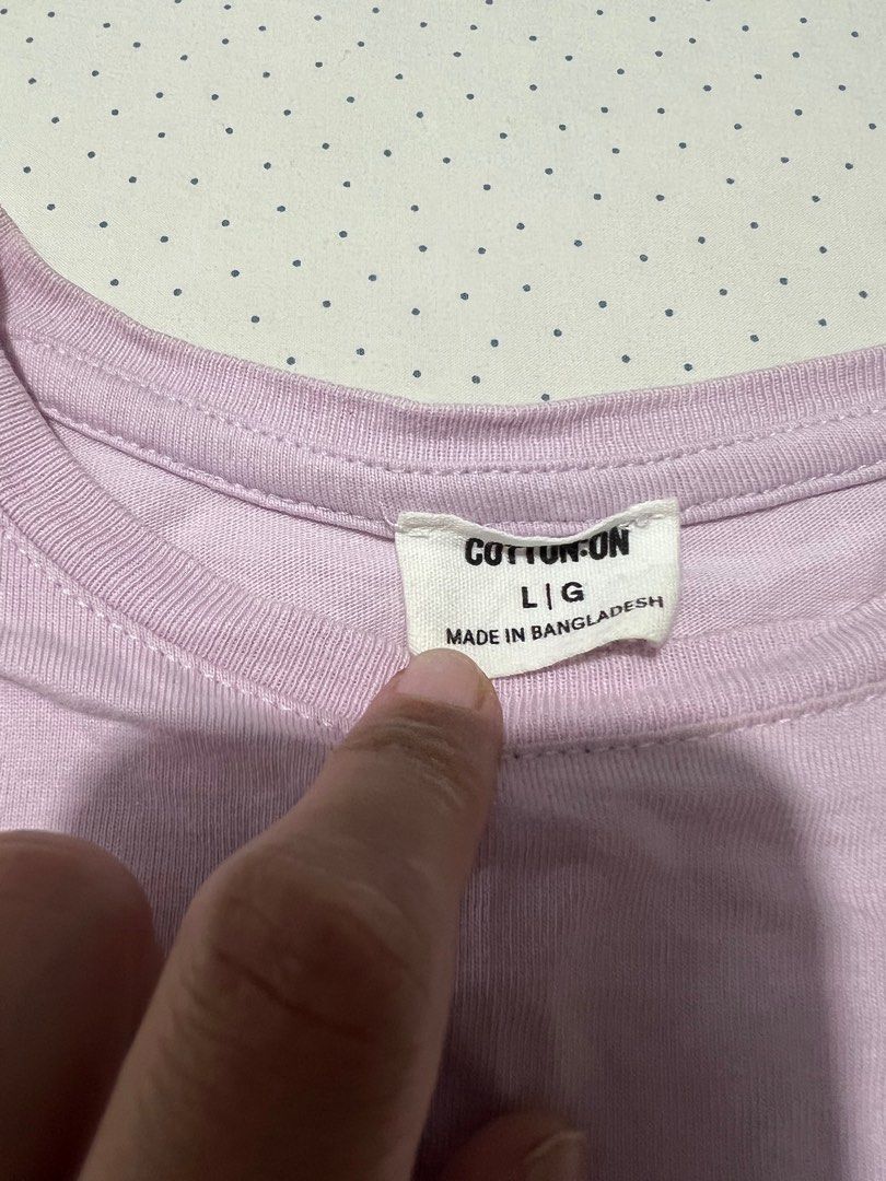 Cotton On slim fit shirt (Category: Blouses) located in Malabon City. Submitted by lesthriftmnl (Listing ID 1342397169, Image 2). Description: Ganda ng fit and tela nya no flaws used once Large on tag bought for 600 on cotton on.