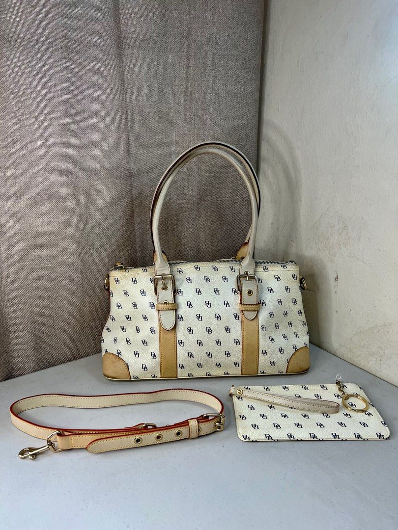 Dooney & Bourke Dome Satchel Bag (Category: Luxury Bags & Wallets) located in Muntinlupa City. Submitted by jbjb08 (Listing ID 1342433279, Image 1). Description: Signs of usage. Negotiable ✨ Pm me for more pics and inquiries 🔸Pay as you order, NO reservation MOP: Gcash ONLY MOD: Lalamove,Grab, J&T or Lbc (shouldered by buyer) .