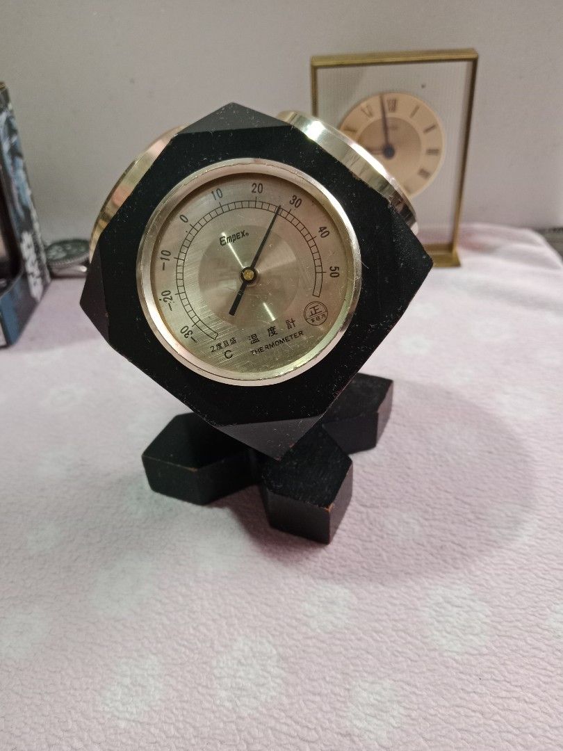 EMPEX Swivel Desk Clock/ Thermometer/ Hygrometer for tabletop (Category: Clocks) located in Tabaco. Submitted by fritznicoleshoppe (Listing ID 1342350802, Image 1). Description: This is a vintage EMPEX Swivel Desk Clock/ Thermometer/ Hygrometer for tabletop. Good for display in your office or at home. Can be rotated as well. see all photos. Clock, Thermometer, & Hygrometer are working. Made in Japan. The clock has a brand new battery (LR1) * you 