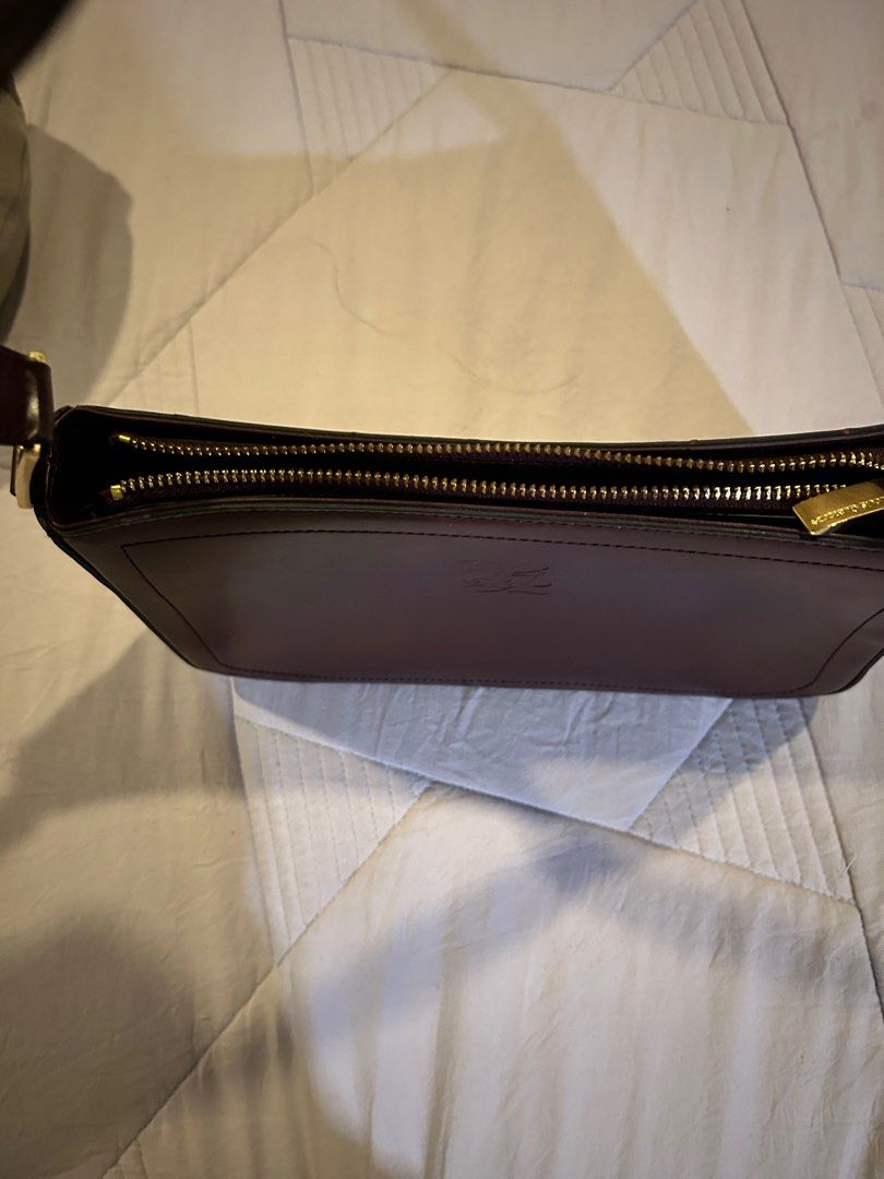 Louis Quatorze Kili bag (Category: Purses & Pouches) located in Paranaque City. Submitted by lemaros (Listing ID 1342359573, Image 2). Description: Preloved maroon colored leather Louis Quatorze kili bag. Leather still ok . hardware is still gold. .