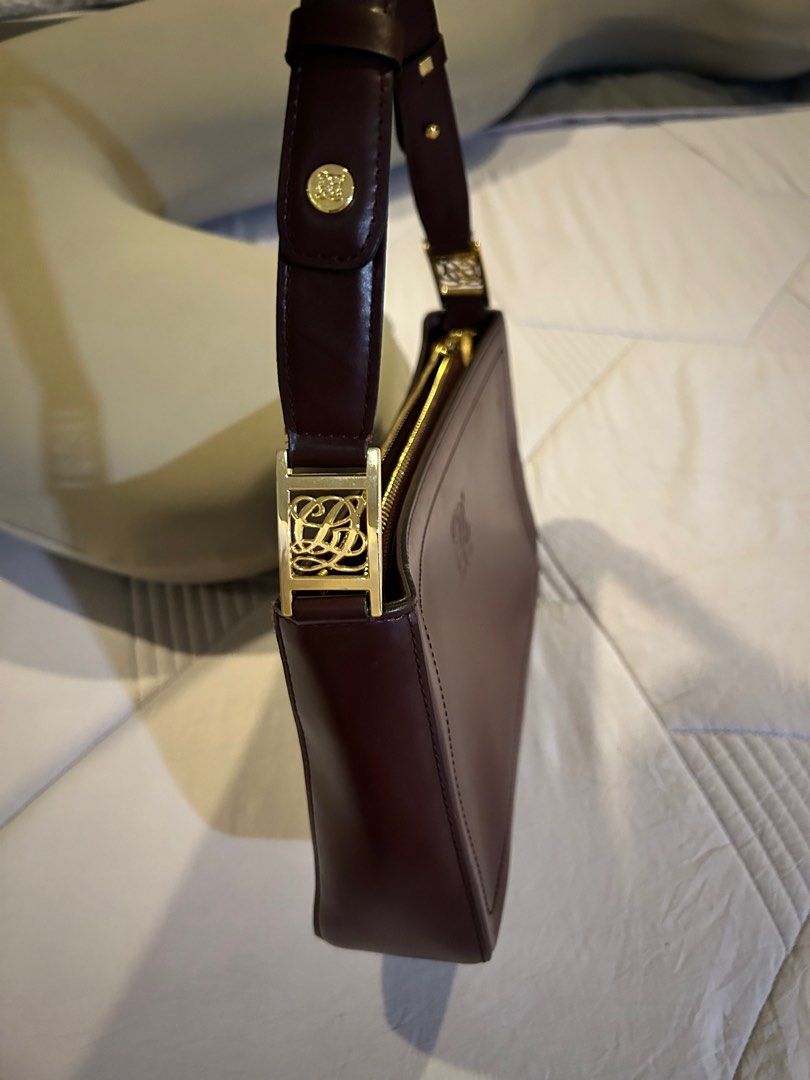 Louis Quatorze Kili bag (Category: Purses & Pouches) located in Paranaque City. Submitted by lemaros (Listing ID 1342359573, Image 3). Description: Preloved maroon colored leather Louis Quatorze kili bag. Leather still ok . hardware is still gold. .