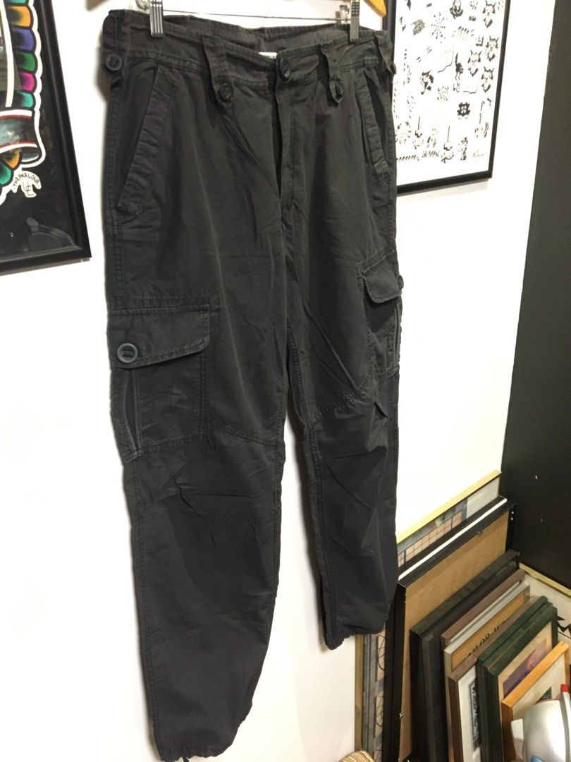 Mastermind Production Cargo Parachute Pants (Category: Jeans) located in Dasmarinas. Submitted by 8ocho8 (Listing ID 1342476321, Image 2). Description: Mastermind Production Brand Cargo Parachute Pants - Multipocket - light cotton fabric - Size Large on tag - 8/10 Color rate - 9/10 Condition Measurement on tape: Waist - 35in Length - 42in Inseam - 31in Leg Opening - 9.5in.