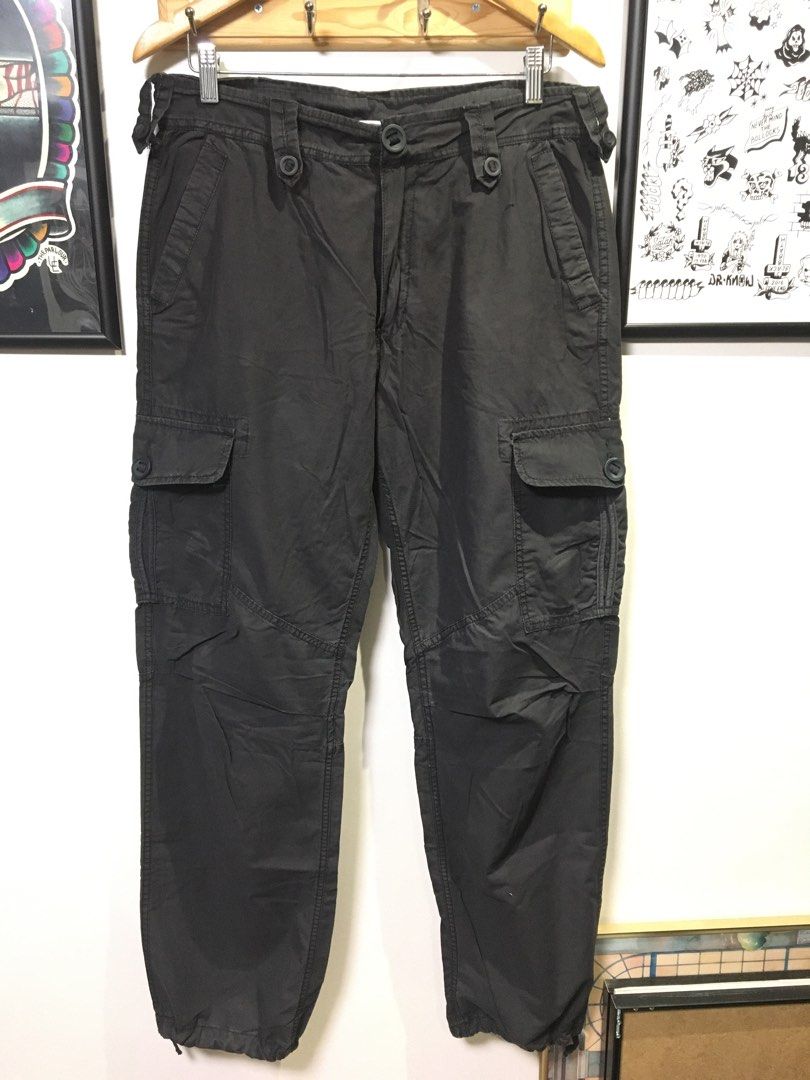 Mastermind Production Cargo Parachute Pants (Category: Jeans) located in Dasmarinas. Submitted by 8ocho8 (Listing ID 1342476321, Image 1). Description: Mastermind Production Brand Cargo Parachute Pants - Multipocket - light cotton fabric - Size Large on tag - 8/10 Color rate - 9/10 Condition Measurement on tape: Waist - 35in Length - 42in Inseam - 31in Leg Opening - 9.5in.