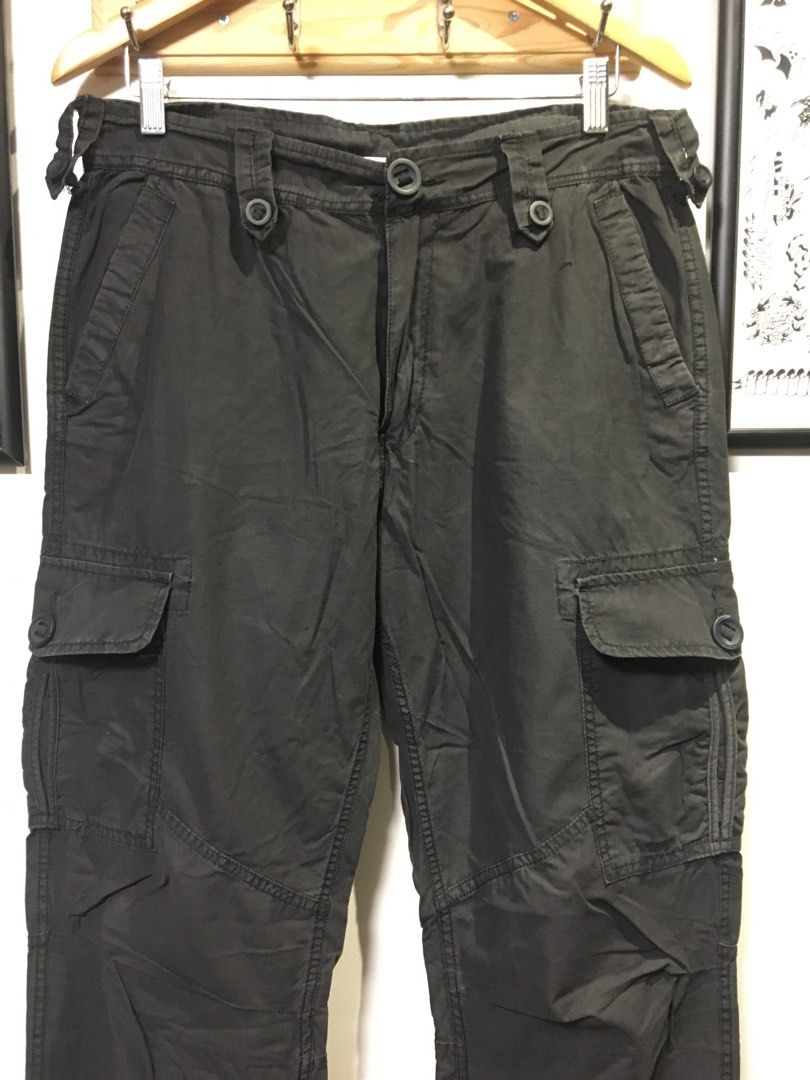 Mastermind Production Cargo Parachute Pants (Category: Jeans) located in Dasmarinas. Submitted by 8ocho8 (Listing ID 1342476321, Image 3). Description: Mastermind Production Brand Cargo Parachute Pants - Multipocket - light cotton fabric - Size Large on tag - 8/10 Color rate - 9/10 Condition Measurement on tape: Waist - 35in Length - 42in Inseam - 31in Leg Opening - 9.5in.