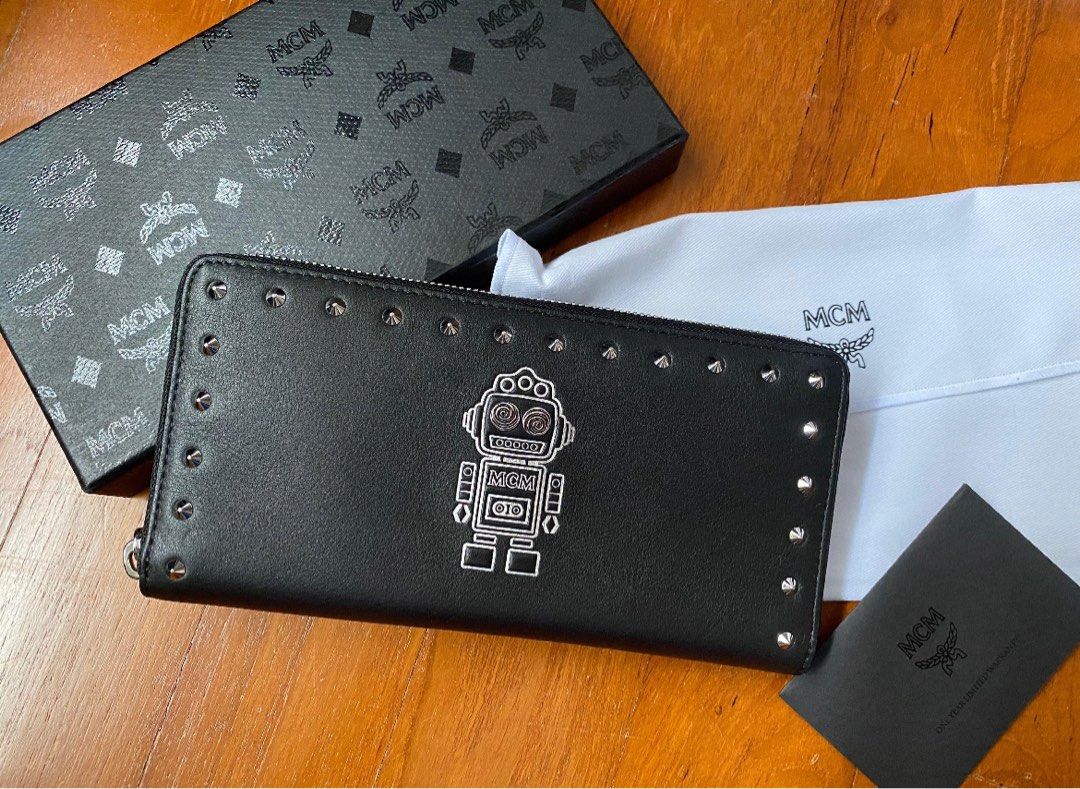 MCM robot Long Wallet (Category: Bags & Wallets) located in Singapore. Submitted by sxthtxo (Listing ID 1342460478, Image 1). Description: -robot eyes and spikes have a little rust but can easily be removed -since there is some rust price can be discussed -$180 if collect my place.