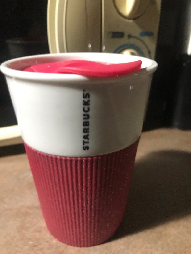 Discontinued Starbucks Cup (Category: Coffee & Tea Tableware) located in Pasig City. Submitted by bendl (Listing ID 1342399209, Image 1). Description: Starbucks Ceramic Cup w cap Discontinued Silicone sleeve (pink with glitters) .