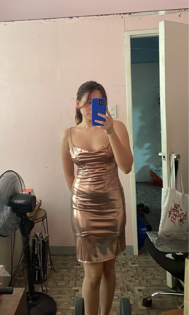 Party Dress (Category: Dresses) located in Makati City. Submitted by makingclosetspacev (Listing ID 1342204391, Image 3). Description: Fits S- Semi Medium (last slide for more details) Metallic Rose Gold color Cowl Neck, A-Line skirt, Bedazzled straps Bought for 750php Never worn, RFS: declutter :P Honest Issue: straps kinda dirty looking.