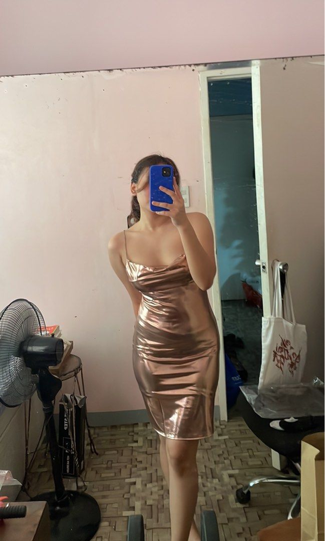 Party Dress (Category: Dresses) located in Makati City. Submitted by makingclosetspacev (Listing ID 1342204391, Image 2). Description: Fits S- Semi Medium (last slide for more details) Metallic Rose Gold color Cowl Neck, A-Line skirt, Bedazzled straps Bought for 750php Never worn, RFS: declutter :P Honest Issue: straps kinda dirty looking.