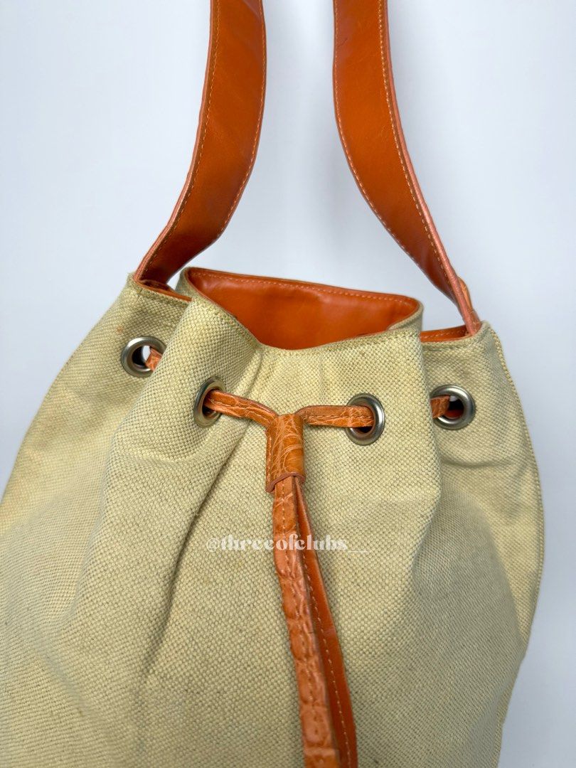 Prada Canvas in Cream and Orange Pattern Leather Bucket Bag (Category: Luxury Bags & Wallets) located in Quezon City. Submitted by threeofclubs__ (Listing ID 1342333416, Image 2). Description: Excellent-very good condition 100% GA Nice canvas body Clean interior Good strap with pattern No cracks No stains No rubs Minimal signs of usage always double check and zoom photos ♣ First to mine and send an order form basis. ♣ 1 day reservation only. ♣ Pl