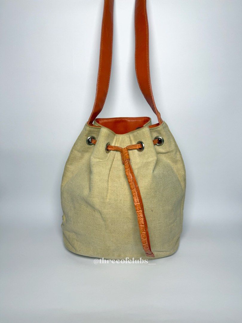 Prada Canvas in Cream and Orange Pattern Leather Bucket Bag (Category: Luxury Bags & Wallets) located in Quezon City. Submitted by threeofclubs__ (Listing ID 1342333416, Image 1). Description: Excellent-very good condition 100% GA Nice canvas body Clean interior Good strap with pattern No cracks No stains No rubs Minimal signs of usage always double check and zoom photos ♣ First to mine and send an order form basis. ♣ 1 day reservation only. ♣ Pl